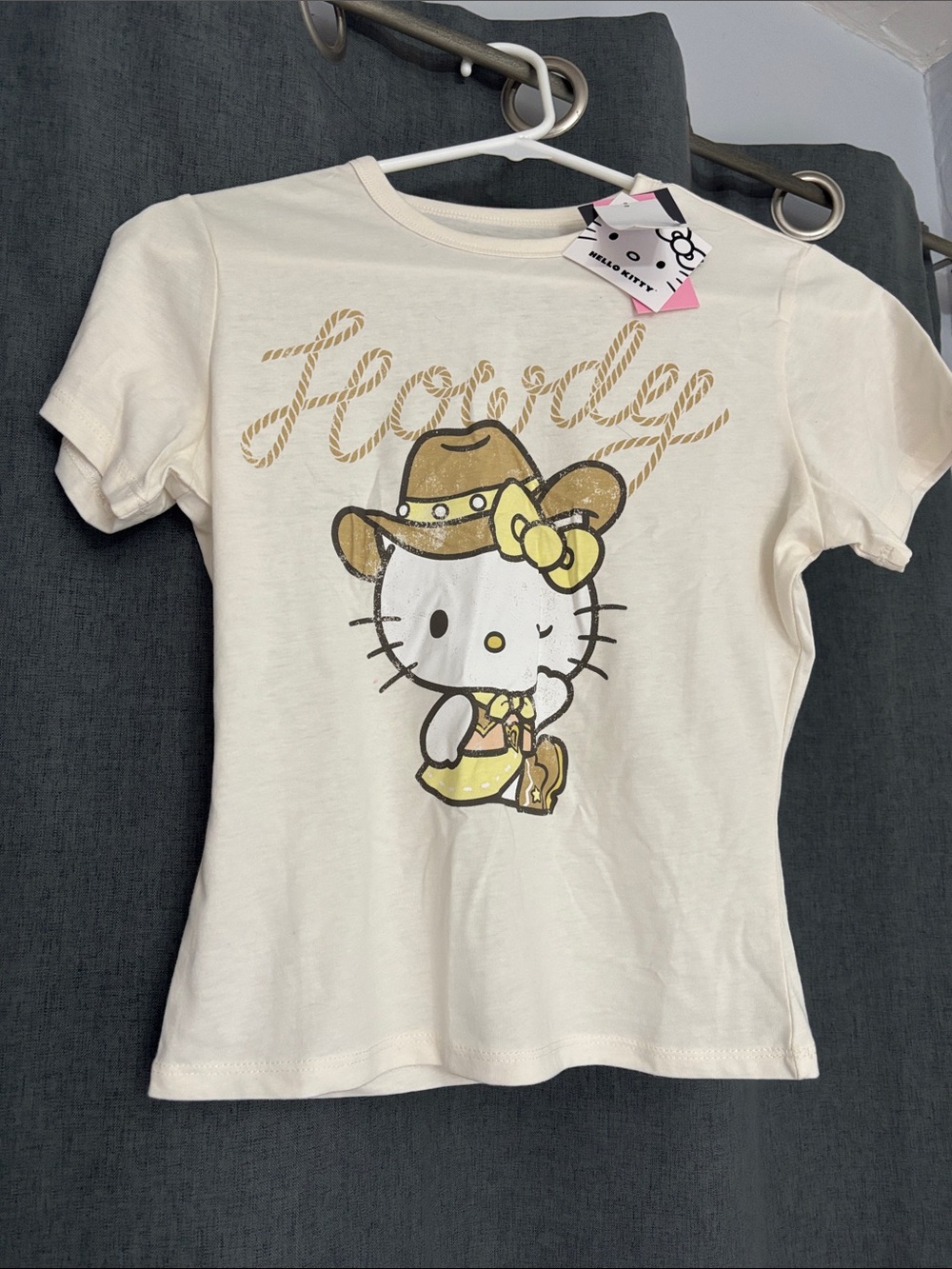 Hello Kitty Cream Tee with Yellow Cowboy Graphic
